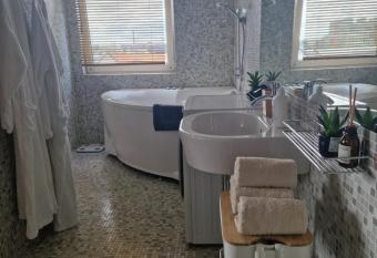 Apartment at seaport has rooms with a private hot tub