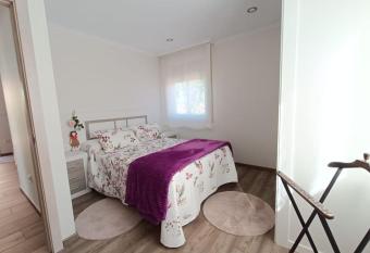 Preciosa casita a 10 minutos de la playa. has Balcony rooms