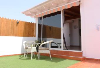   tico Con Barbacoa y Terraza Exclusiva. allows 18 year olds to book a room