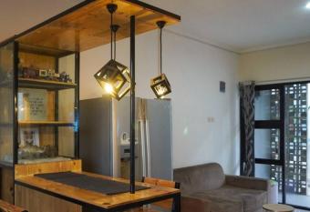 Cozy Haven with Jacuzzi, Rooftop has rooms with a private hot tub