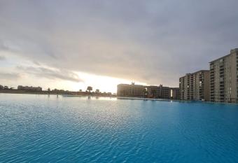 Hermoso departamento con laguna y tinas de hidromasaje has Balcony rooms