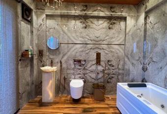 KIA Villa - 3BHK Private Pool & 2 Jacuzzis has rooms with a private hot tub