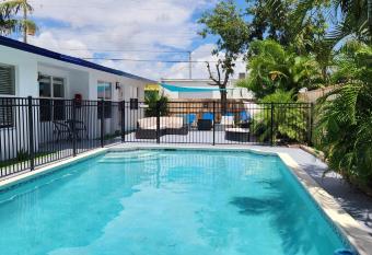 Prime Location Gateway with Pool & Patios, Near Beaches, Groceries and Restaurants allows 18 year olds to book a room