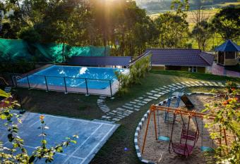 Green Lawn Pool Cottage has Balcony rooms