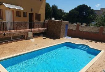 Bonita casa con piscina comunitaria a 100 metros del mar has Balcony rooms