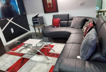 Elegant Home Away From Home. (Basement Apartment) has rooms with a private hot tub