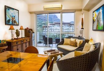 Family beach apartment with lagoon view at Pico de Loro has Balcony rooms