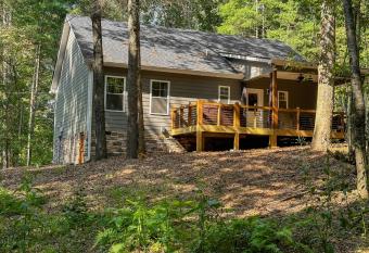 NEW! Blissful Point Forest Cabin has rooms with a private hot tub