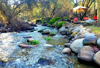 Magical River House ! 10 min to SNP park entrance allows 18 year olds to book a room