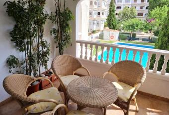 Nice and cozy flat with pool next to the beach has Balcony rooms