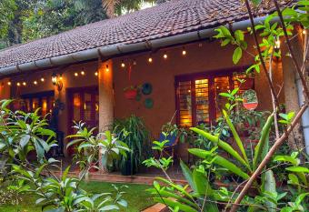 Peace Lily Cottage has Balcony rooms