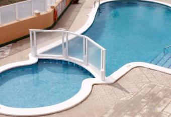 Bright Apt, terrace,heated pool. has Balcony rooms