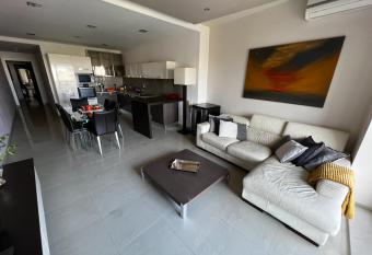 Central, bright and very spacious Gzira apartment allows 18 year olds to book a room