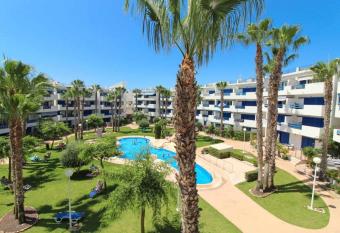 La Calma Apartamento,Playa Flamenca,4 swimming pools,private parking place. has Balcony rooms