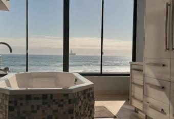 Beachfront Villa has rooms with a private hot tub