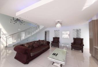 Sea ~ Breeze ~ Villa has rooms with a private hot tub