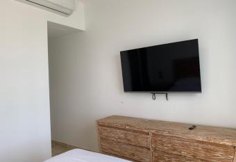 Penthouse @Hard Rock Golf Resort has rooms with a private hot tub