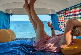 Live free in a simple campervan on the beach has Balcony rooms