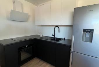 Joli appartement neuf avec jardinet has Balcony rooms