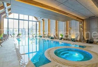 Apartman Titova Vila has rooms with a private hot tub