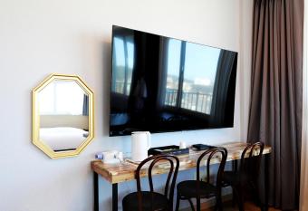 The Rest Tourist Hotel has rooms with a private hot tub