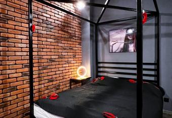 BDSM Red Room Apartment has rooms with a private hot tub