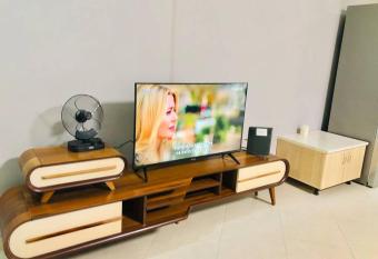 Orion Central Apartment has rooms with a private hot tub