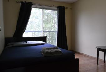 Private bedroom on the main floor - Fonda has Balcony rooms