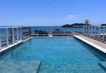 Flat em condom  nio com piscina e jacuzzi em Bombinhas allows 18 year olds to book a room