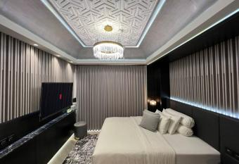 Monochromic Studio Apartment by Kinasih Suites has Balcony rooms