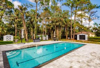 Beautiful Home in Naples with Huge Private Pool allows 18 year olds to book a room