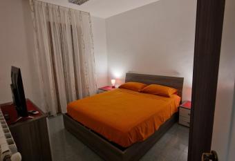 Attico al 4   ed ultimo piano con terrazzino e vista panoramica has Balcony rooms