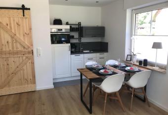 FeWo Hafenkoje am Timmeler Meer in Gro  efehn has Balcony rooms