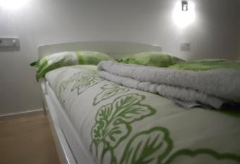 Flame City Center ApHEARTment has rooms with a private hot tub