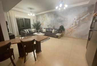 Luxury Furnished 2 Bedroom Apartment has rooms with a private hot tub