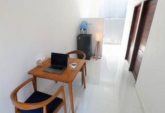 Mini tropical home with office has Balcony rooms