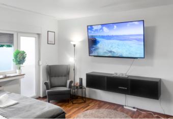 Relax Oasis with 65 SmartTV, Kitchen and Balcony has Balcony rooms