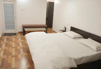 Shri Kachi Dham Home Stay has Smoking/Balcony rooms