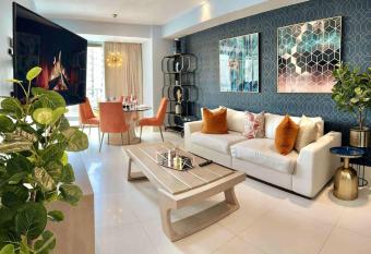 Upscale Centric Apt Near All has rooms with a private hot tub