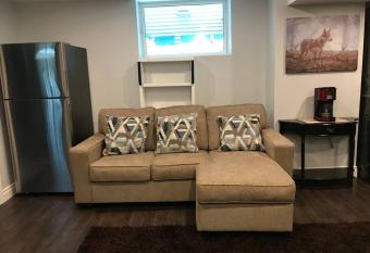 Charming 2 Bedroom Basement Apartment has rooms with a private hot tub