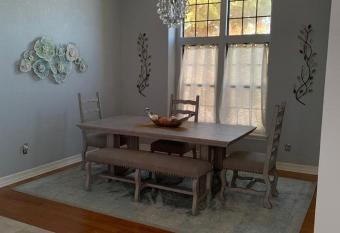 Beautiful house in a very quiet area has rooms with a private hot tub