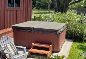 Tiny Paradise Escape llc has Balcony rooms