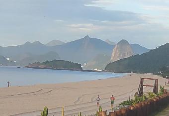 Loft quadra da praia garagem has Balcony rooms