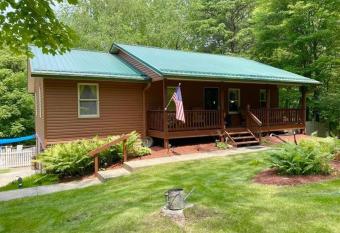 The Perfect Space for both Summer and Winter Fun has rooms with a private hot tub