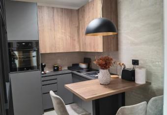 SREBRNI VRHOVI Penthouse has rooms with a private hot tub