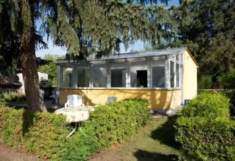 Ferienhaus mit Wintergarten am See (Angelparadies) has Balcony rooms
