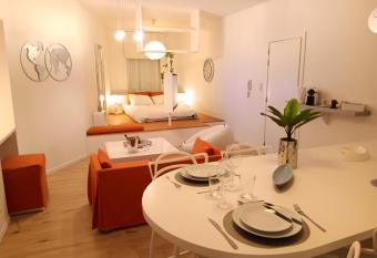 The Luxury White Suite has rooms with a private hot tub