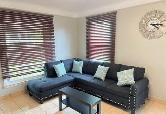 Home in the Heart of Dearborn, Beautiful Queen Beds, Multiple TVs has Balcony rooms