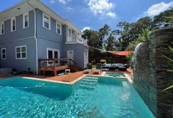 GrandCraftsman style home with pool and hot tub/ center to all of New Orleans has rooms with a private hot tub