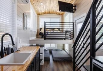 Jasper tiny home with private hottub has rooms with a private hot tub